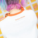 ケアベア ロンT オレンジ *LIMITED TO CERTAIN COUNTRIES